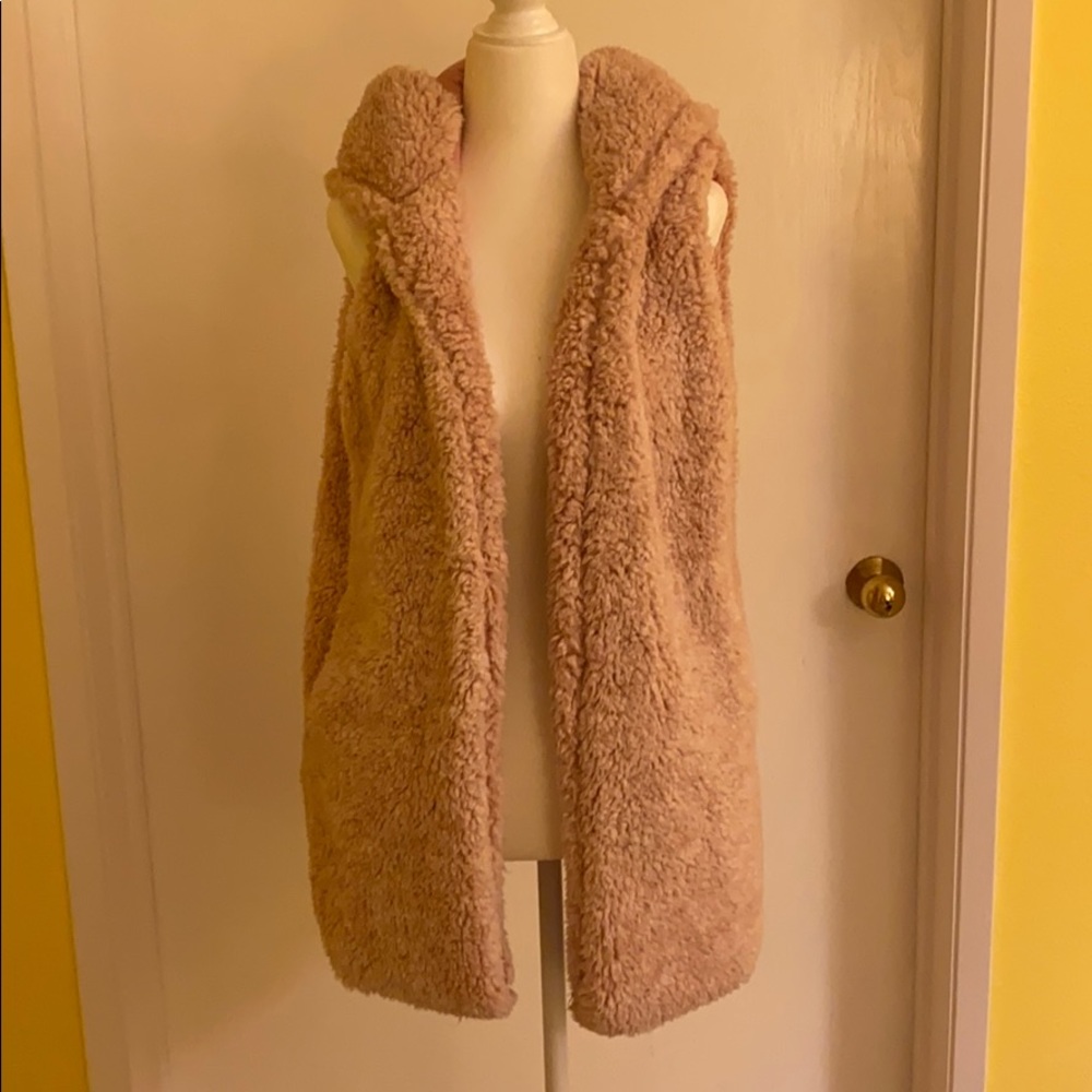 Light pink fluffy vest